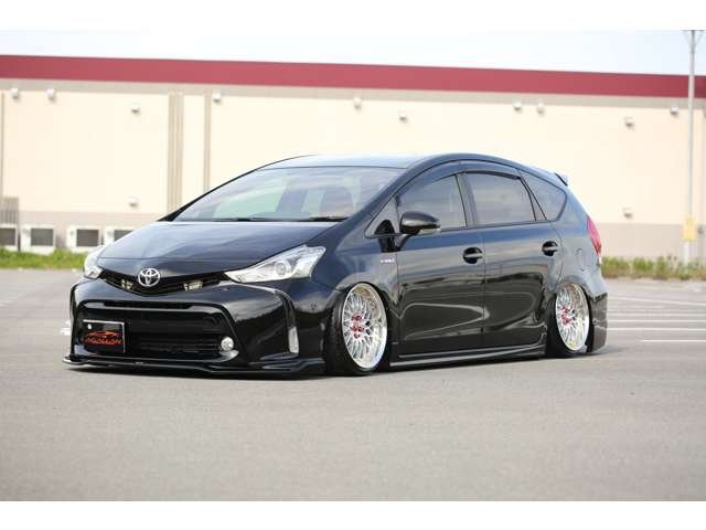 プリウスα　Ｓツーリングセレクション入庫しました！カスタム車両です！エアサス　ＷＯＲＫ　社外マフラー　社外ナビ　リアモニター　シートカバー　カスタム多数の１台です！お気軽にお問い合わせください！