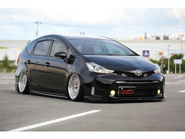 プリウスα　Ｓツーリングセレクション入庫しました！カスタム車両です！エアサス　ＷＯＲＫ　社外マフラー　社外ナビ　リアモニター　シートカバー　カスタム多数の１台です！お気軽にお問い合わせください！